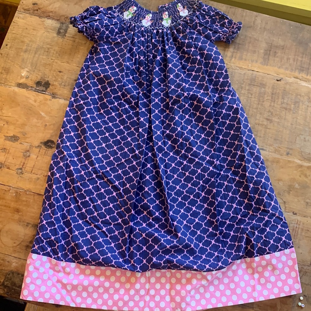 Navy and pink smocked dress. Size 8